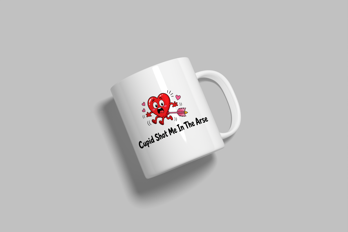 Cupid Shot Me In The Arse funny mug, white 11oz ceramic novelty gift, angled side view
