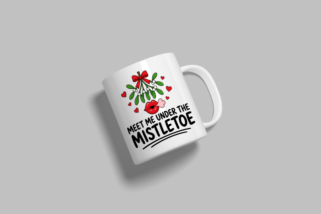 Meet Me Under The Mistletoe funny mug, white 11oz ceramic novelty gift, angled side view