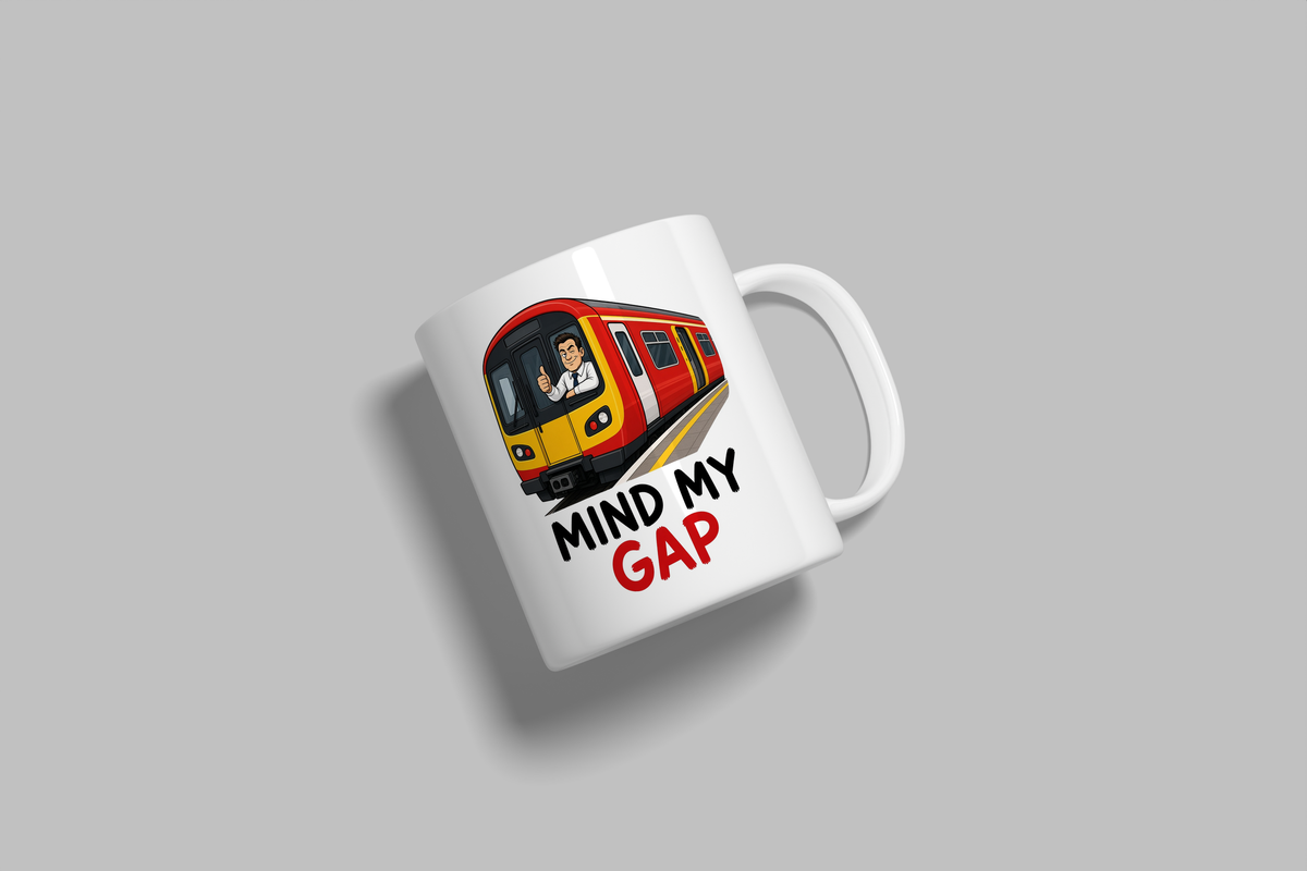 Mind My Gap funny mug, white 11oz ceramic novelty gift, angled side view