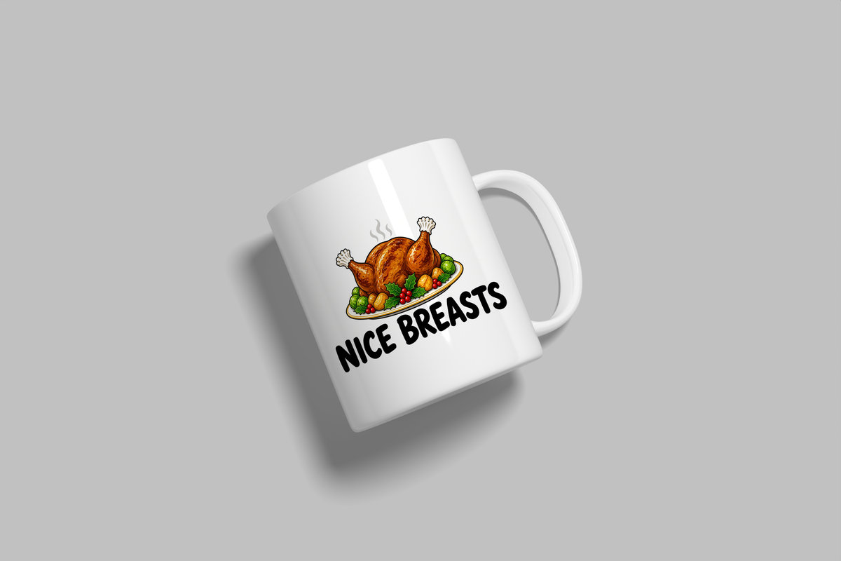 Nice Breasts funny mug, white 11oz ceramic novelty gift, angled side view