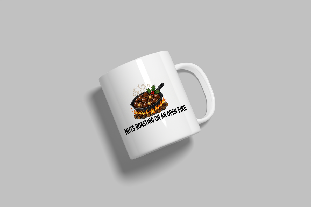Nuts Roasting On An Open Fire funny mug, white 11oz ceramic novelty gift, angled side view