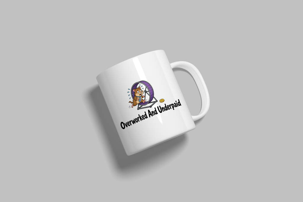 Overworked And Underpaid funny mug, white 11oz ceramic novelty gift, angled side view